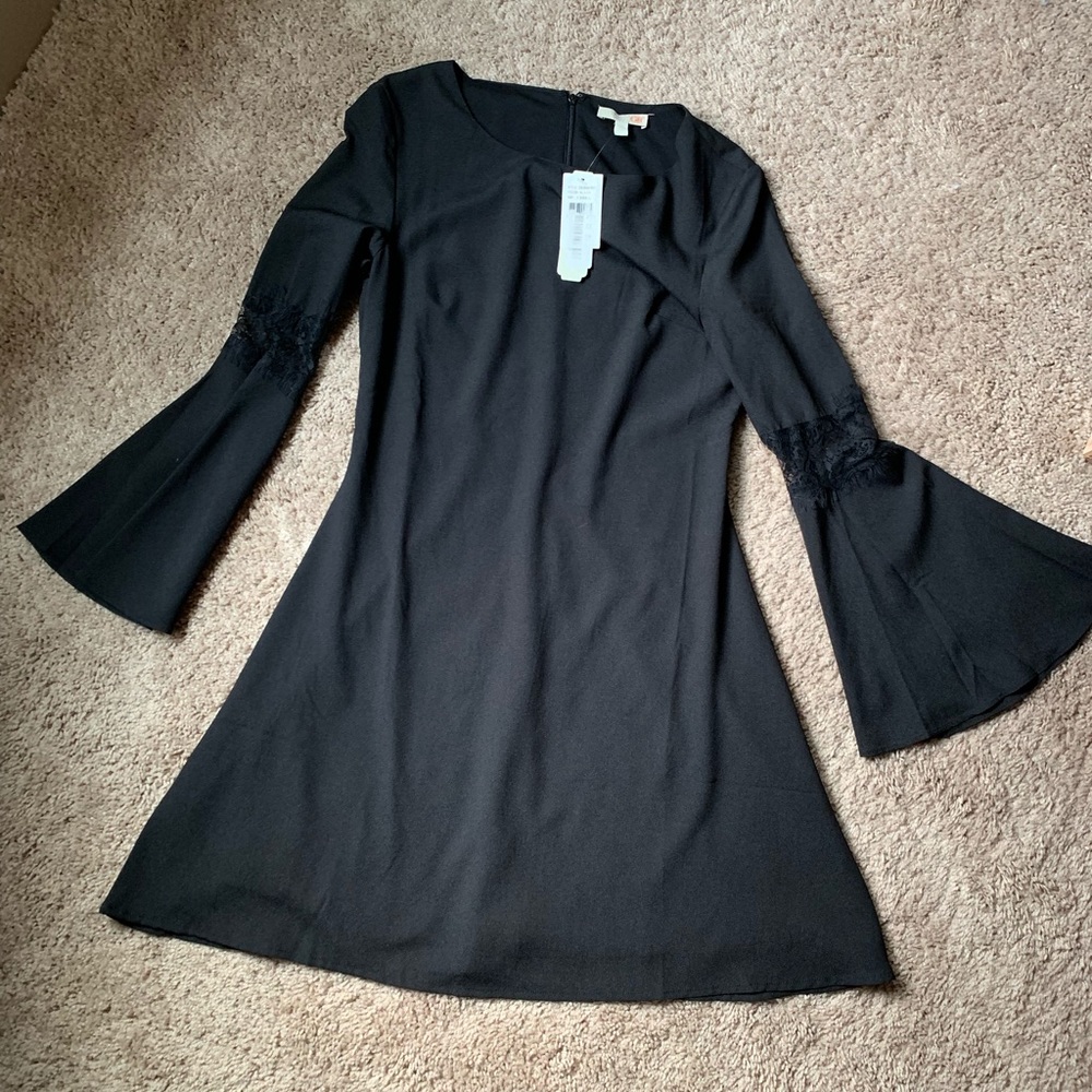 Black Gianna Bini dress with bell sleeves